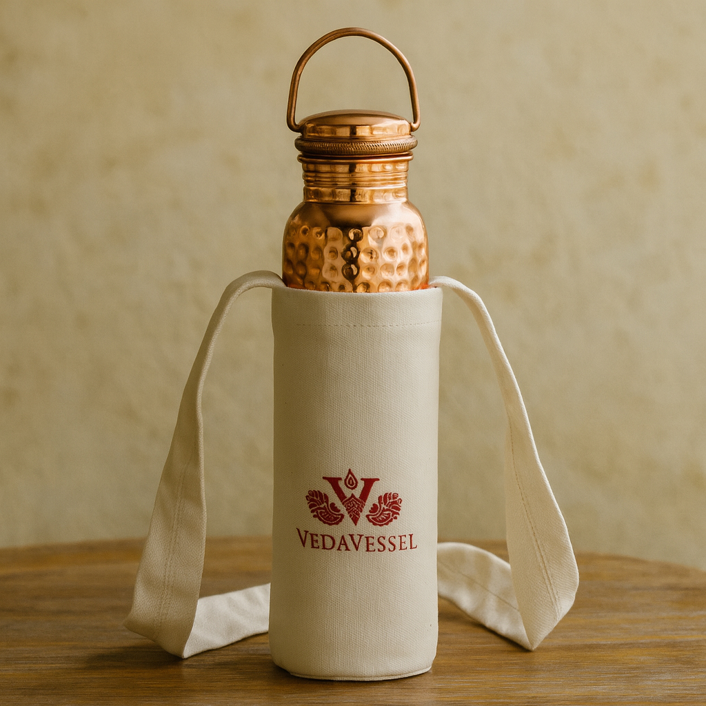 VedaVessel 64oz hammered copper bottle with handle in carry sleeve